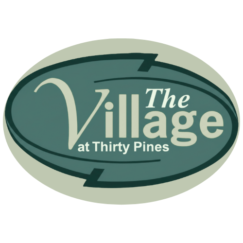 The logo for The Village at Thirty Pines.